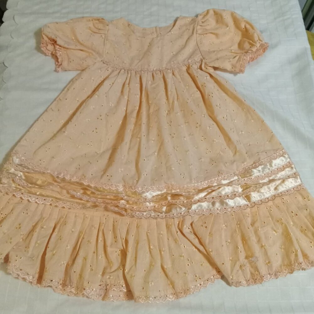 Ensemble in English lace, almost peach in color, with hat, dress, and overcoat